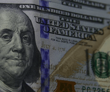 Dólar retoma negócios influenciado por petróleo perto de US$ 100 novamente